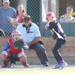 John Fisken photo &mdash; A North Whidbey batter prepares to swing at a pitcher. Andrew Hilton, South Whidbey Little League 11/12&rsquo;s catcher, is ready with an open glove.