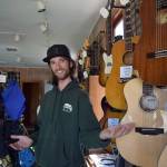 Kyle Jensen / The Record &mdash; Keegan Harshman, 25, recently returned to his hometown of Langley to open a music store in downtown Langley. His father, Chris Harshman, is the South Whidbey High School band director.