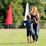 Record file &mdash; A mom dances with her son during one of last year&rsquo;s outdoor concerts.