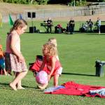 Record file &mdash; Kids play while their family have a picnic during last year&rsquo;s Concerts in the Park series.