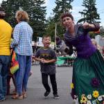 Kyle Jensen / The Record &mdash; Kids chase Hahna Luna (right) while she performs her &ldquo;Fairy Magic&rdquo; entertainment routine.