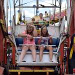 Kyle Jensen / The Record &mdash; The rides are always a highlight with the younger crowd, with a roller coaster, spinning cups and a ferris wheel occupying the northwest area of the fairgrounds.