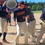 Genevieve Black photo &mdash; South Whidbey Crabs player Nick Black, 13, braces as his teammate Elisha Sargent dumps water on him following a victory over the Snohomish Stingrays on Sunday at Community Park.
