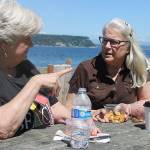 Evan Thompson / The Record &mdash; Carole Riggin of Clinton (left) and Langley resident Louise Richardson (right) enjoy a lunch at Seawall Park on June 22 with the Saratoga Passage in the background. The Seawall Park Ad Hoc Committee recommended a theme of &lsquo;natural beauty&rsquo; for the park.