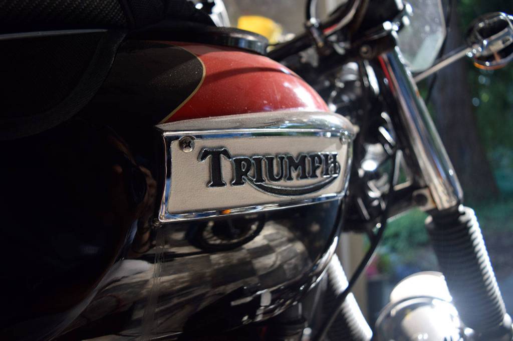 Kyle Jensen / The Record &mdash; Brown&rsquo;s 1973 Triumph Trident only needs a quick dusting off before the car show on July 8.