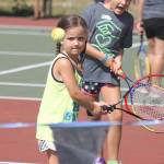 Evan Thompson / The Record &mdash; Jayda Coleman, 5, eyes the approach of a tennis ball during the third and final day of the Mega Sports Camp at South Whidbey High School.