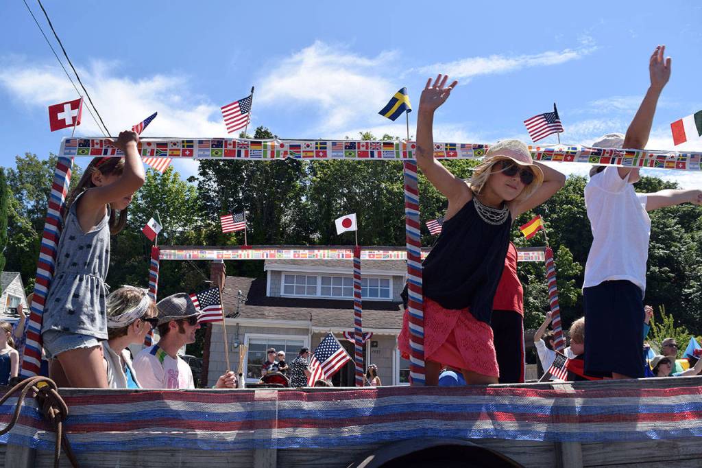 Kyle Jensen / The Record &mdash; Marchers took the opportunity to spread their own message to the crowd, including the globalized message on this truck.