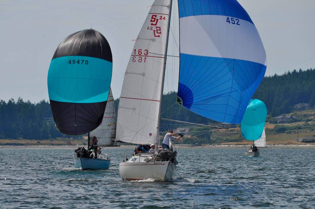 Dave Steckman on Renaissance, center, and Bill Walker on Ehu Kai, right, finished fourth and seventh, repectively, in this weekend&rsquo;s regatta. (Photo by Steve Hucke)