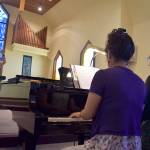 Kyle Jensen / The Record &mdash; Attendee Cathy Humphers Smith conducts two pianists on the opening day of the Pacific Northwest Conducting Institute.