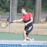 Evan Thompson / The Record &mdash; South Whidbey senior Hank Papritz returns a volley during a preseason practice this past week.