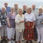 Evan Thompson / The Record &mdash; Langley High School&rsquo;s class of 1957 held a 60th high school reunion on Thursday at Hong Kong Gardens in Clinton. Left to Right, back row: Lorraine (Smith) Nemitz, Brian Martin, Eric Hammer, Jim Scott, Jerry Kaufman, Don Bergquist, Willie (Bill) Meinhold, Jim Scott. Front row: Barbara (Simmons) Kyllo, Ruth (Gabelein) Primeau, Pat (Perry) Porter, Louise (Becker) Burton, Mary Sue (Kinskie) Lile, Linnea (Westin) O&rsquo;Brien.