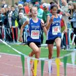 Karen Swegler photo &mdash; South Whidbey freshman runner Kaia Swegler Richmond beat Bothell&rsquo;s Monseratt Lopez to the finish line during the Sehome Invitational on Sept. 9.