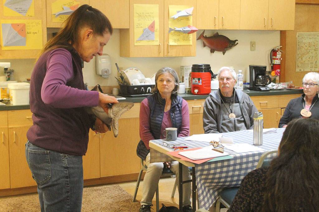 Evan Thompson / The Record &mdash; Marie Bergstrom, a member of the Whidbey Watershed Steward&rsquo;s board, taught volunteers about the anatomy of Pacific Salmon during a training session on Sept. 16.