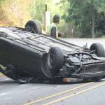 Clinton man uninjured in rollover crash