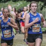 Matt Simms photo &mdash; South Whidbey junior Alexandra Kurtz (left) and senior Elizabeth Donnelly (right) finished 24th and 26th, respectively, at the Nike Hole In the Wall XC Invitational on Oct. 7 at Lakewood High School.