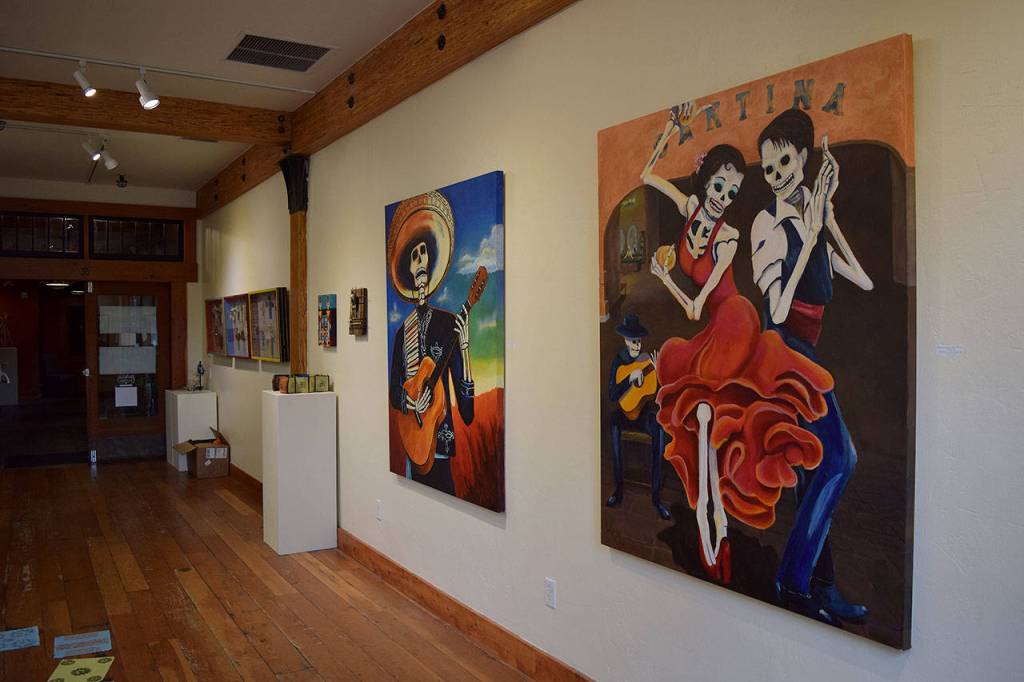 Kyle Jensen / The Record &mdash; Art associated with Day of the Dead typically depicts skeletons in a celebratory manner.