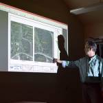 Kyle Jensen / The Record &mdash; South Whidbey Parks and Recreation Director Doug Coutts shows commissioners where one design would connect a new road to Highway 525.