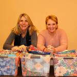 Contributed photo &mdash; Michele Bolvin (left) and Janette Skardaal (right) traveled to Malawi, Africa on Tuesday to provide feminine hygiene products to women and young girls.