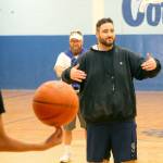 Evan Thompson / The Record &mdash; Josh Coleman, South Whidbey Middle School&rsquo;s boys basketball head coach, speaks to the team during during practice on Thursday afternoon at Langley Middle School&rsquo;s main gymnasium.