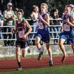 Matt Simms photo &mdash; South Whidbey boys cross country runners Callahan Yale (center) and Michael Cepowski (right) qualified for state by placing 18th and 20th, respectively.