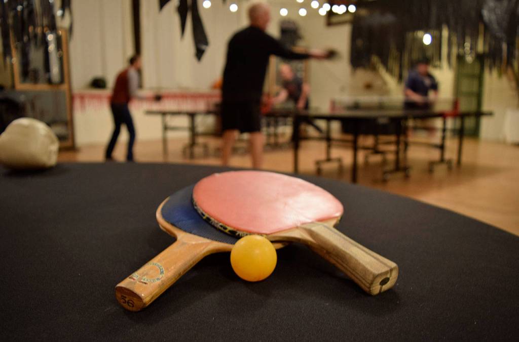 Kyle Jensen / The Record &mdash; The table tennis group provides paddles, balls and tables for the weekly game nights.