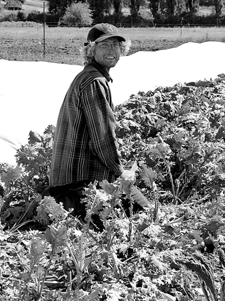 Contributed photo                                Student Nick Conard works in the farm school&rsquo;s kale garden.