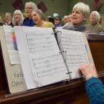 Kyle Jensen / The Record  Accompanist Kathy Fox turns the page during a rehearsal this past Monday evening.