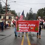 Kyle Jensen / The Record  Despite the downpour and brisk temperatures, marchers happily strolled through town to bring the Christmas cheer to Langley.