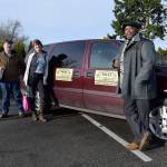 Kyle Jensen / The Record  The leadership at Safe Ride Home is ready to get the wheel rolling again. Left to right: founder Brian Grimm, advisor Jessica Leon and All Island Taxi driver Tony Caldwell.