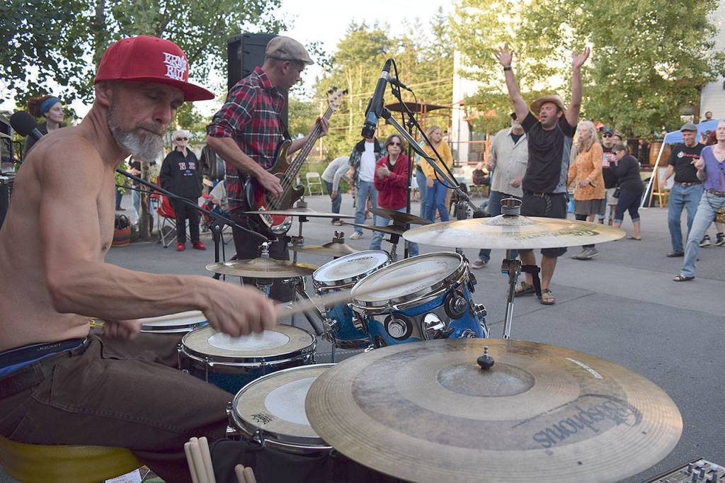 Kyle Jensen / The Record  Krash Zen drummer Rachman Ross and bassist Stephen Ross play in front of a crowd at the Bayview Street Dance on June 28 at the Bayview Cash Store.