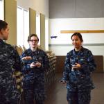 From left, Elijah Lisenby, Kenna Kooyman and Fia Cooper-Ewing practice using small drones during winter Sea Cadet training at Camp Casey. Photo by Laura Guido/Whidbey News-Times