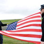 Left, Travis Finning and Almazano Bergeron practice folding the flag at Sea Cadet winter training at Camp Casey. The training ran from Dec. 26-Jan. 1 and 76 cadets attended. Photo by Laura Guido/Whidbey News-Times