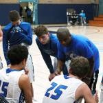 Contributed photo  South Whidbey head coach Mike Washington talks with his team during the San Diego tournament in late December.