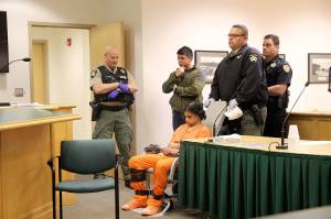 Photo by Jessie Stensland / Whidbey News-Times                                Louis Scarpino of Oak Harbor appears in Island County Superior Court in a restraint chair Wednesday because he was accused of being disorderly and intimidating a judge the day before.