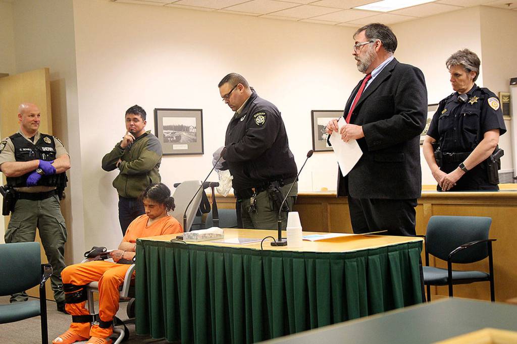 Photo by Jessie Stensland / Whidbey News-Times                                Louis Scarpino of Oak Harbor appears in Island County Superior Court in a restraint chair Wednesday because he was accused of being disorderly and intimidating a judge the day before.