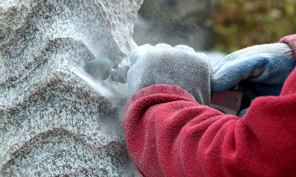 Sculptor Sue Taves at work. Close-up of artists working on their craft are included in Wodjenskis book. Photo provided by Wodjenski Creative
