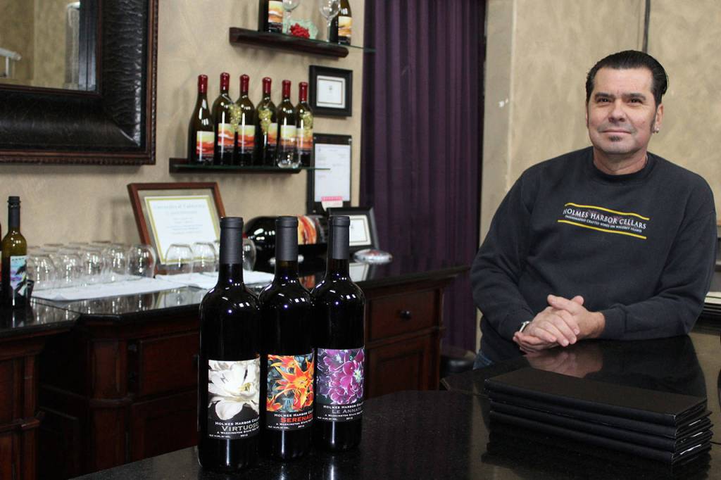 Greg Martinez, an airlines pilot and owner of Holmes Harbor Cellars, in his tasting room. The Greenbank winery is one of five locations on this years Wine, Spirits and Chocolate Tour. Tickets are $25 in advance.