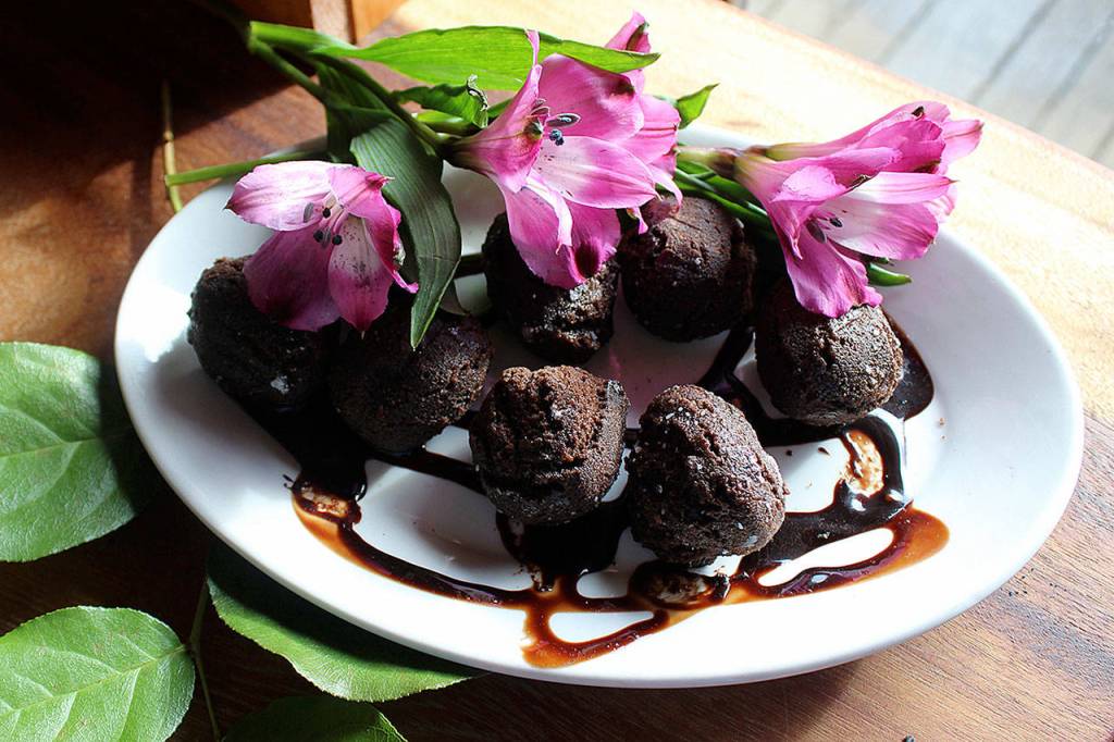 Bayviews Whidbey Doughnuts joins the wine tour this year with doughnut holes made from dark chocolate cake mix, sugar glaze, caramel sea salt sprinkle. They will be served at their neighbors, Blooms Winery. Photo by Patricia Guthrie