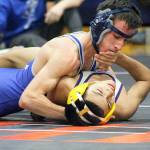 Evan Thompson / The Record  South Whidbey freshman 113-pounder Drew Aposhyan pinned Goldendales Ivan Cazares in the 1A Region 2 tournament on Saturday to advance to the Mat Classic.