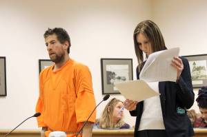 Jessie Stensland / Whidbey News Group                                John Bagley, left, makes a preliminary appearance in Island County Superior Court Monday. Hes accused of pawning a telescope stolen from a robotics club.
