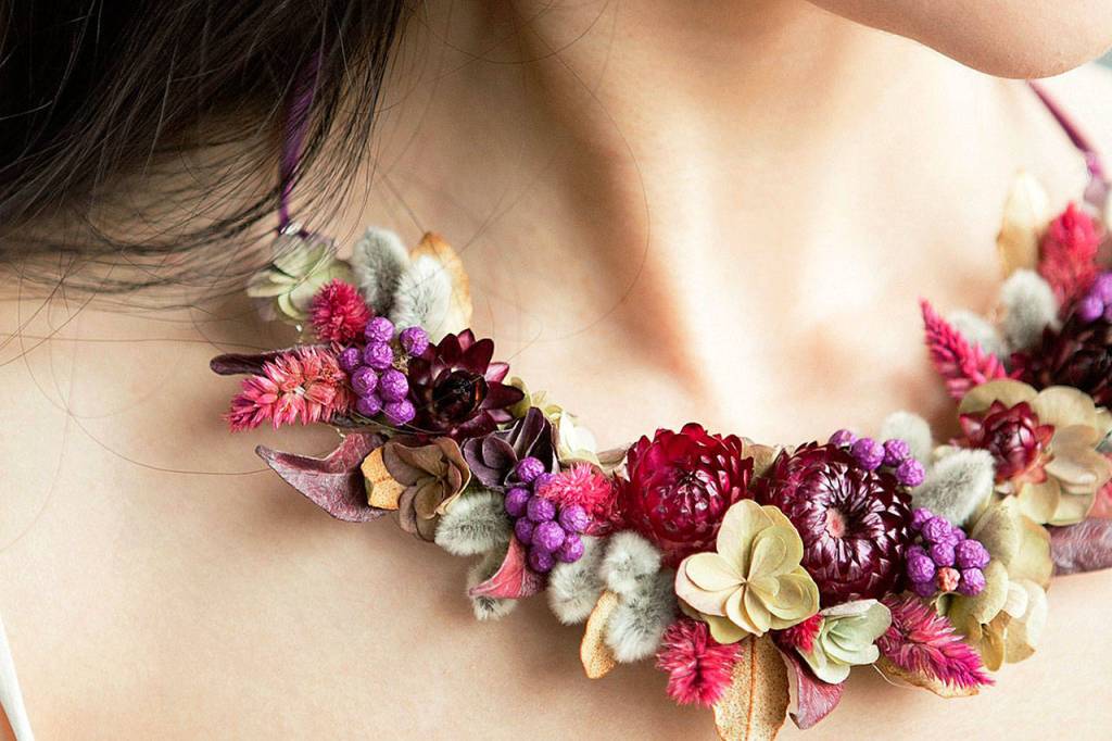 Floral necklaces for brides are a specialty of Tobey Nelson Events and Design. Photo provided