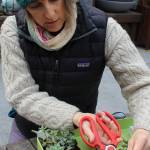 Tobey Nelson cuts tiny pieces of a succulent plant to use on her botanical jewelry creations. Nelson is teaching a floral jewelry class at the upcoming Whidbey Gardening Workshop. Photo by Patricia Guthrie/Whidbey News-Times