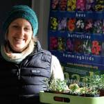 At Venture Out, a Clinton nursery, Tobey Nelson brings in supplies to demonstrate her unique craft turning fresh flowers and plants into wearable art. Photo by Patricia Guthrie/Whidbey News-Times