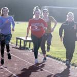 Evan Thomspon / The Record                                South Whidbey track and field athletes practice sprinting on Thursday afternoon. From left to right: Serena McLain, Leanne Robbins, Sophia Nielsen, Grace Complita and Mikayla Hezel.