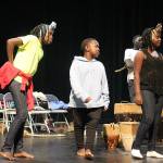Monday afternoon, Dance of Hope practiced on stage at South Whidbey High School preparing for Fridays public performance. Left to right are Apio Lima Natako, Shafique Abudallah and Damalie Nabisubi.