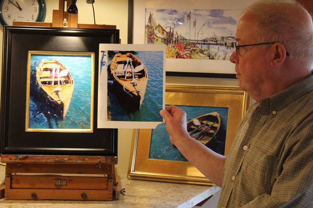 Dan Burroughs works from photos and likes to paint boats, bridges, trains and industrial scenes. This painting is of a classic wooden rowboat tied up one day at the Coupeville wharf.