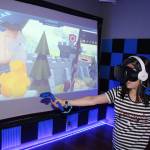 Silvana Iosve recently donned Holodeck Virtual Reality gear and shot arrows at marauding Vikings at the Machine Shop in Langley. Photos by Patricia Guthrie/Whidbey News Group