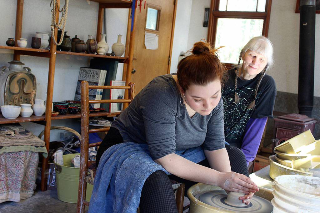 Artist mentor Joan Govedare and Waldorf student Megan Fickel met weekly in her South Whidbey studio. Fickel learned different pottery styles, how to throw clay, sculpt shapes on the wheel and how to fire and paint pots.