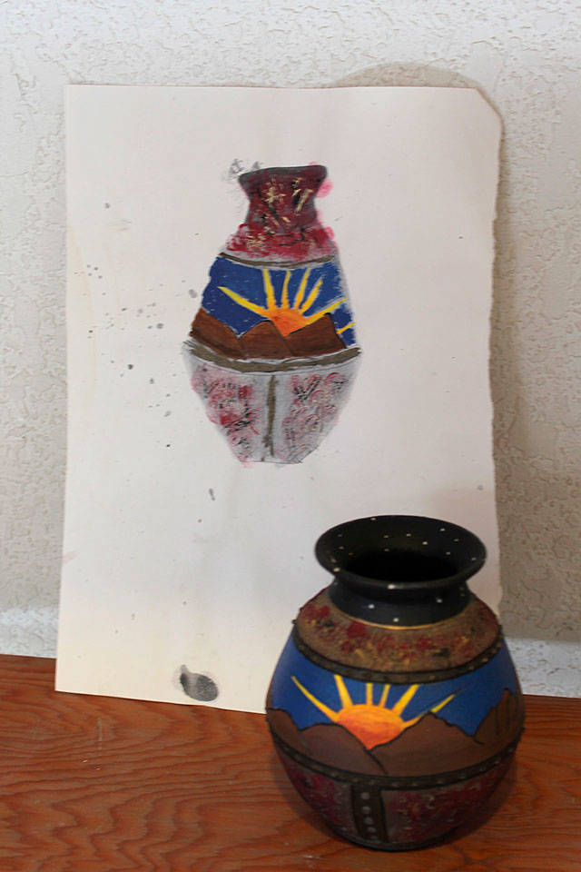Megan Fickel first sketched out and then created this raku pot as part of her 8th-grade project.