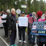 South Whidbey High School parents and other supporters joined in Wednesdays national Enough school walkout aimed at reducing gun violence and remembering 17 students and faculty killed in Florida last month. They lined the road in front of the closed campus where students gathered.